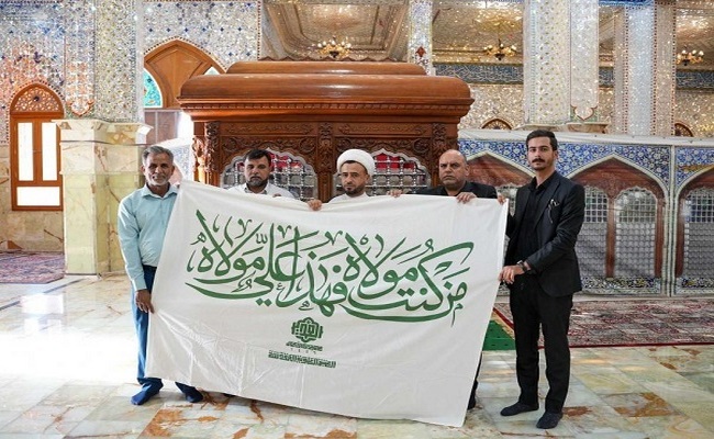 Qədir-Xum bayrağının İraqdakı şiə ziyarətgahlarına hədiyyə edilməsi